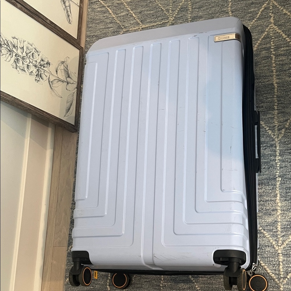 Elegant Light Blue Suitcase with Wheels